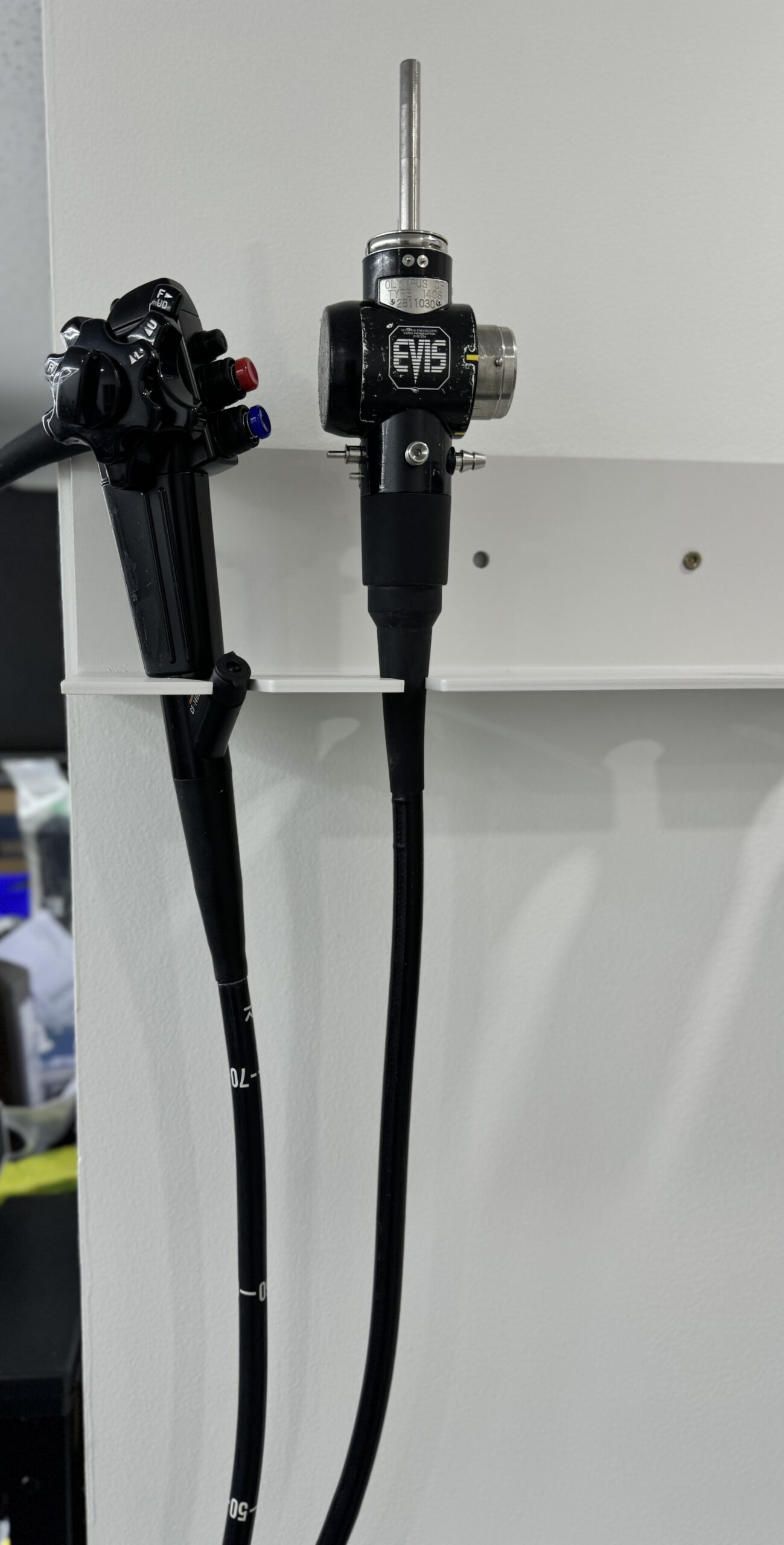 flexible endoscope mounted on wall.