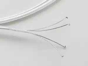 Clear curved wires on white background