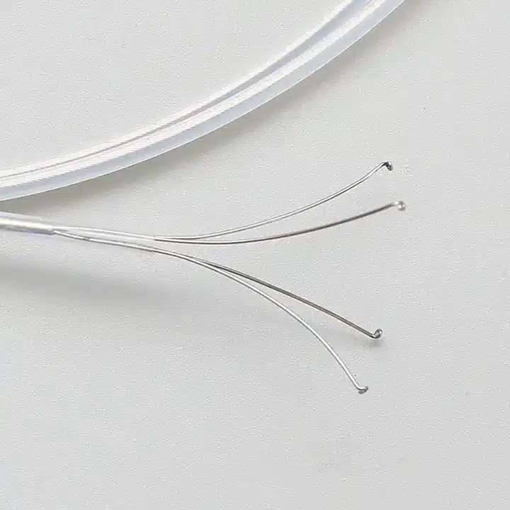 Clear curved wires on white background