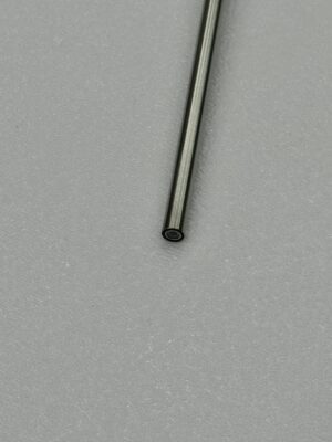 Close-up of a metal rod on textured gray background