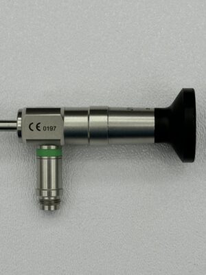 Close-up of a medical otoscope on a gray background