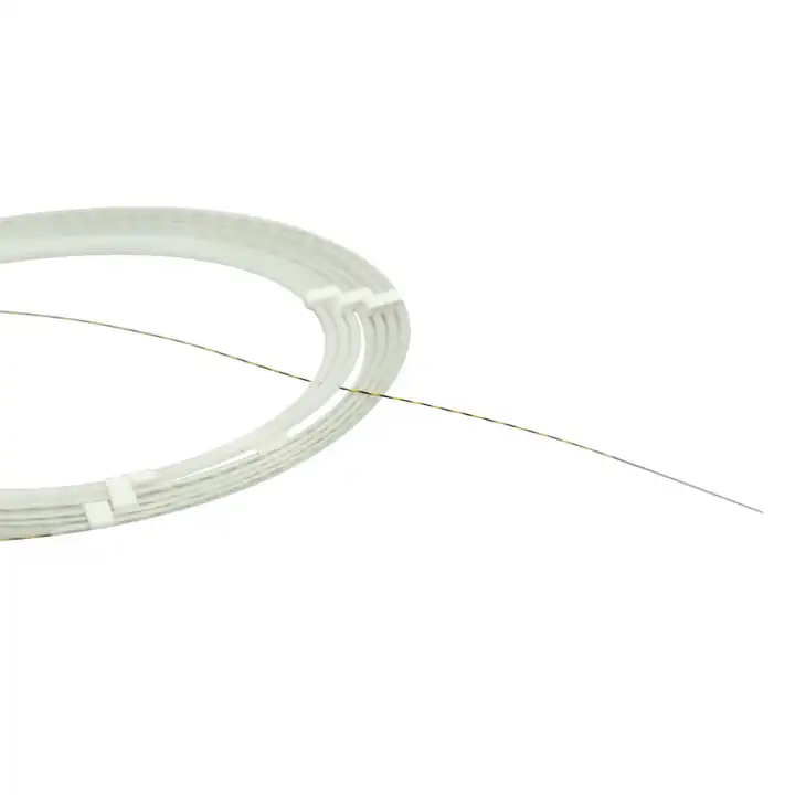 Close-up of a white circular surgical suture