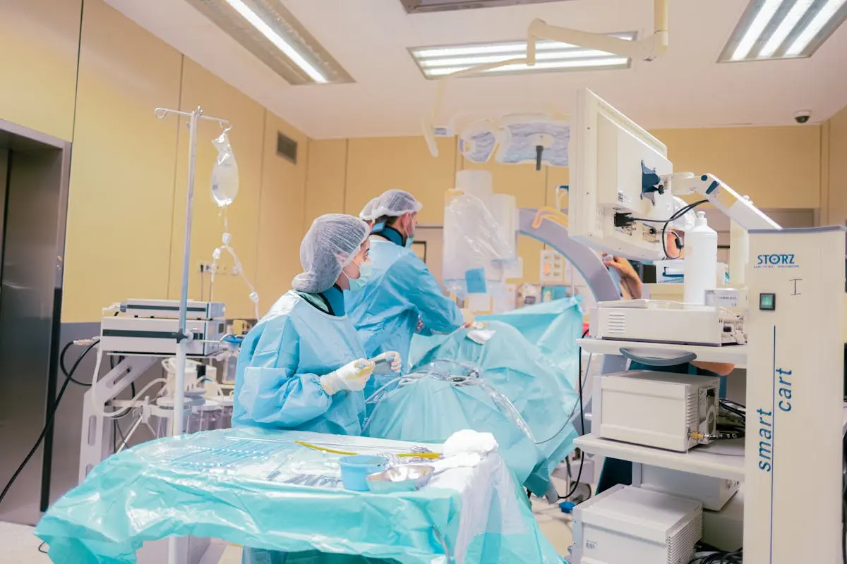 Surgeons operating in a well-equipped medical facility